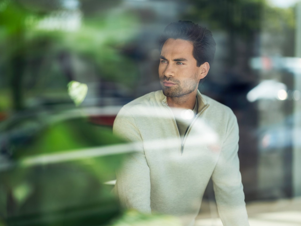 Man standing by plants