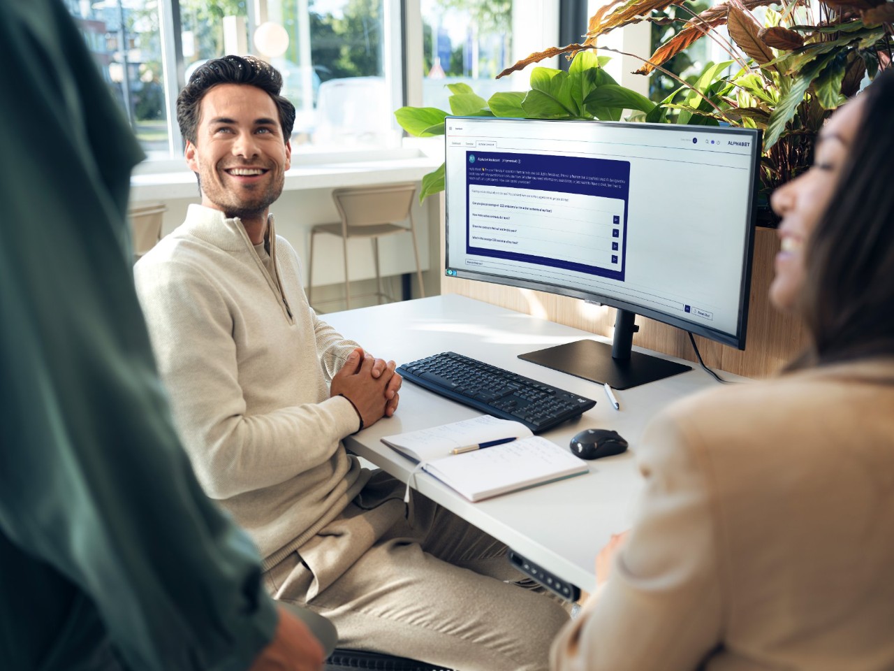 Man at a desk with the alphabet website open