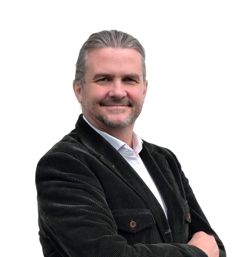Professional portrait of William Townsend in business attire against a neutral background.